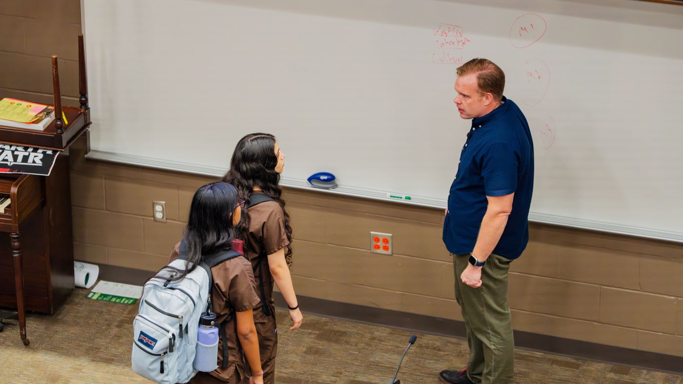 Ben Roberts answering students' questions after class